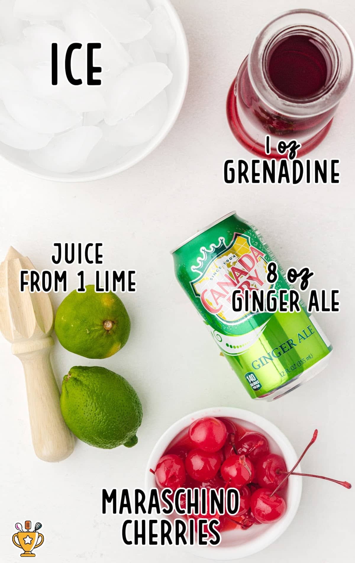 Flat lay of Shirley Temple ingredients including ice, grenadine, lime juice, ginger ale, and maraschino cherries on a white background.