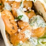 Tall pin graphic with close-up of shrimp tacos and overlay text: “The best shrimp tacos recipe – drizzled with spicy cilantro lime sauce!”