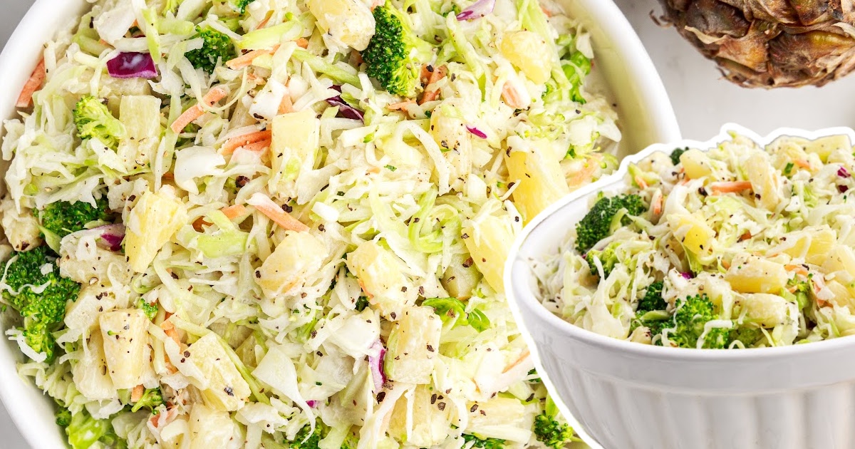 Zoomed-in image of coleslaw texture showing crunchy cabbage, juicy pineapple chunks, and black pepper seasoning.