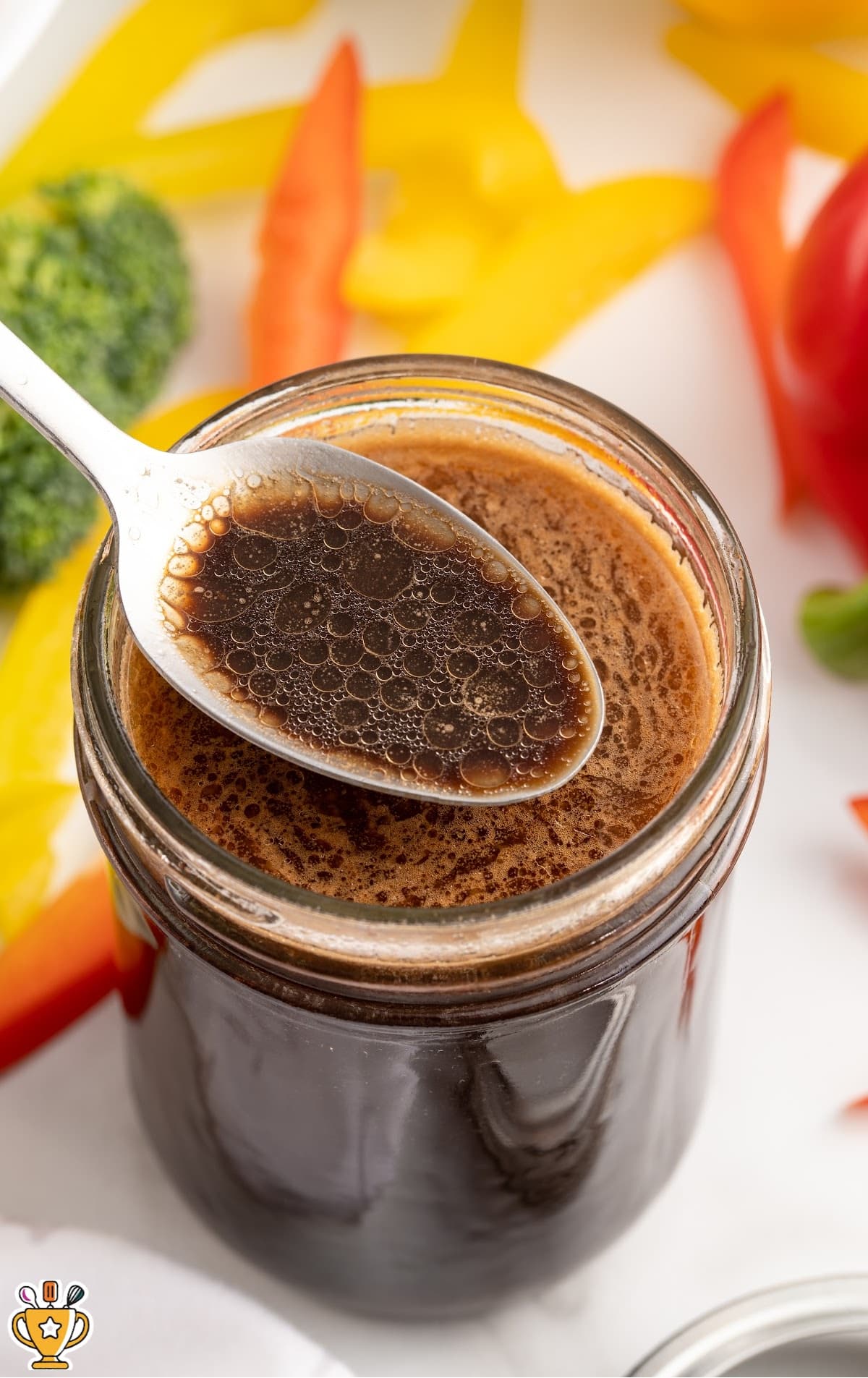 a spoon holding some 3 Ingredient Stir Fry Sauce