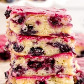 a stack of Blueberry Lemon Blondies