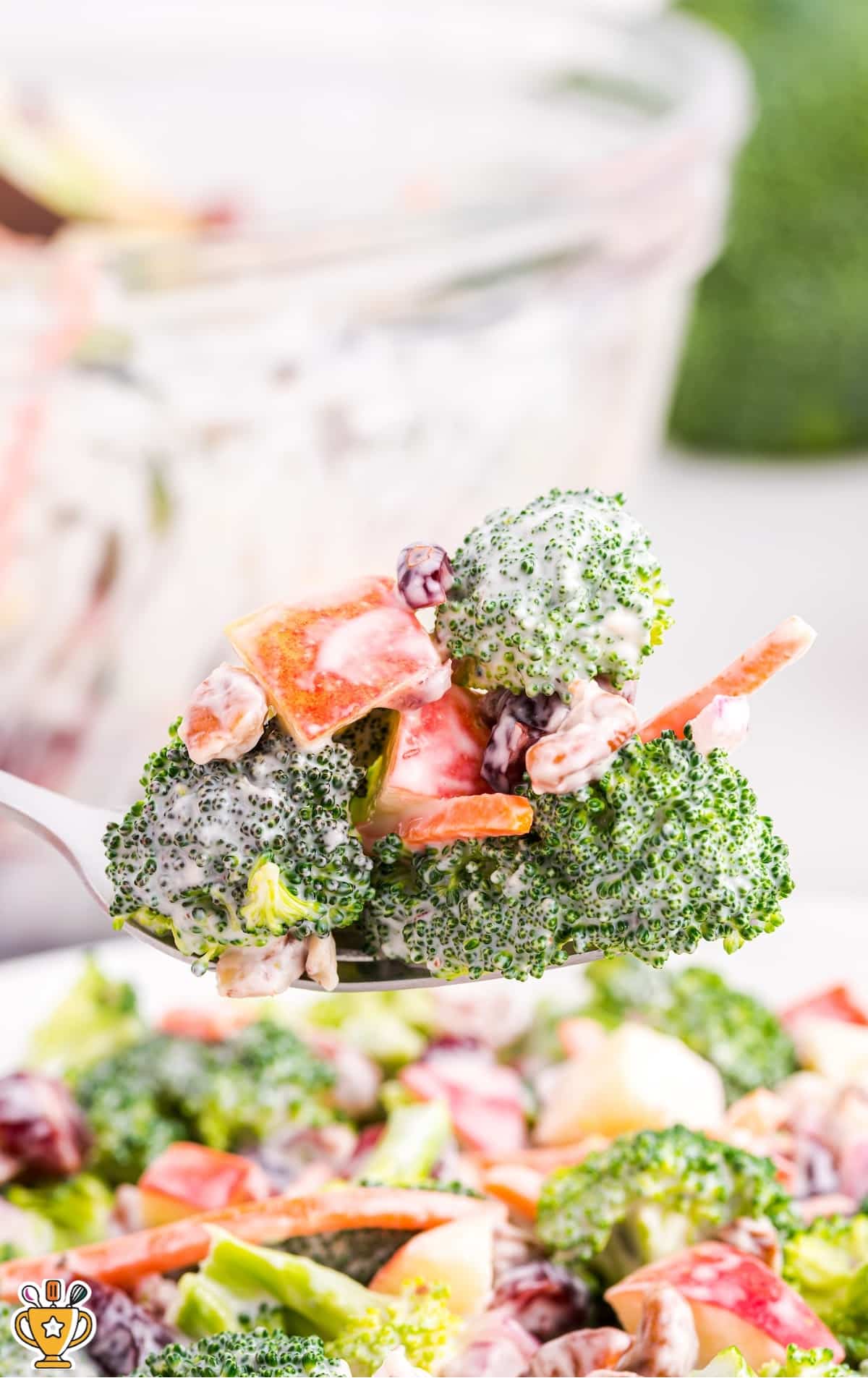 a fork holding some Broccoli Apple Salad