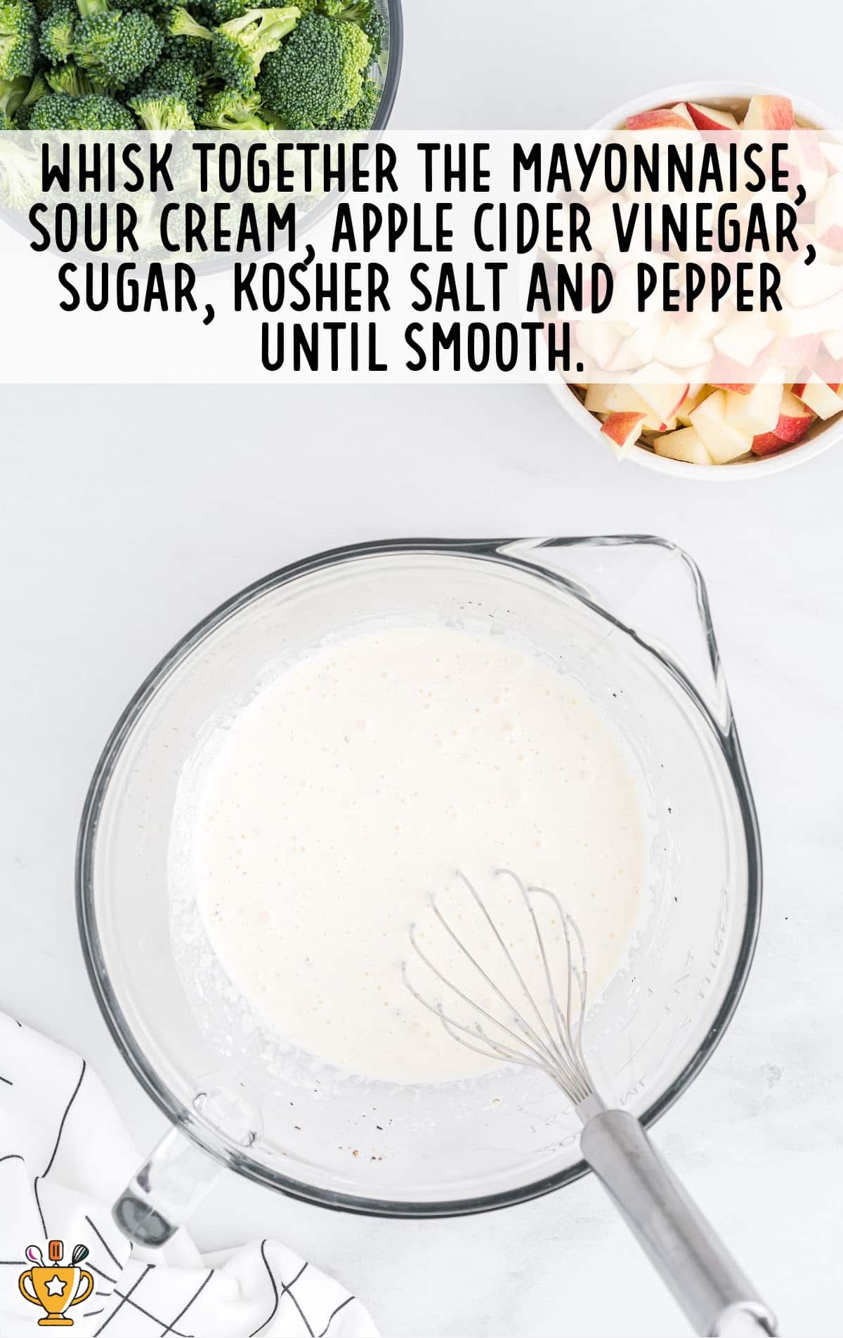 whisking together mayonnaise, sour cream, apple cider vinegar, sugar, kosher salt and pepper