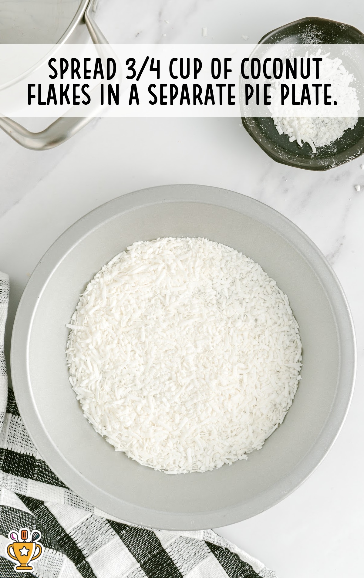 Thickened coconut mixture in a saucepan during cooking process