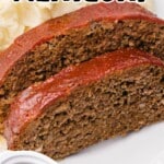 two slices of Crockpot Meatloaf on a white plate