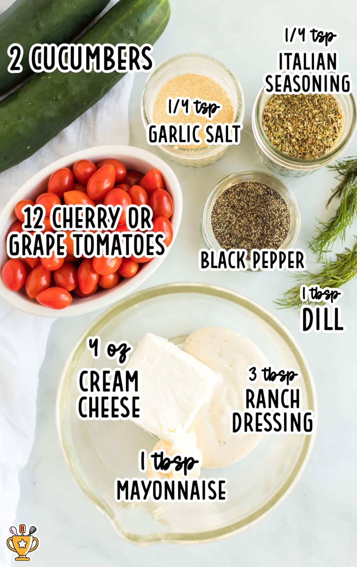 Labeled overhead image of all ingredients including cucumbers, cherry tomatoes, cream cheese, ranch, mayo, and seasonings on a white surface