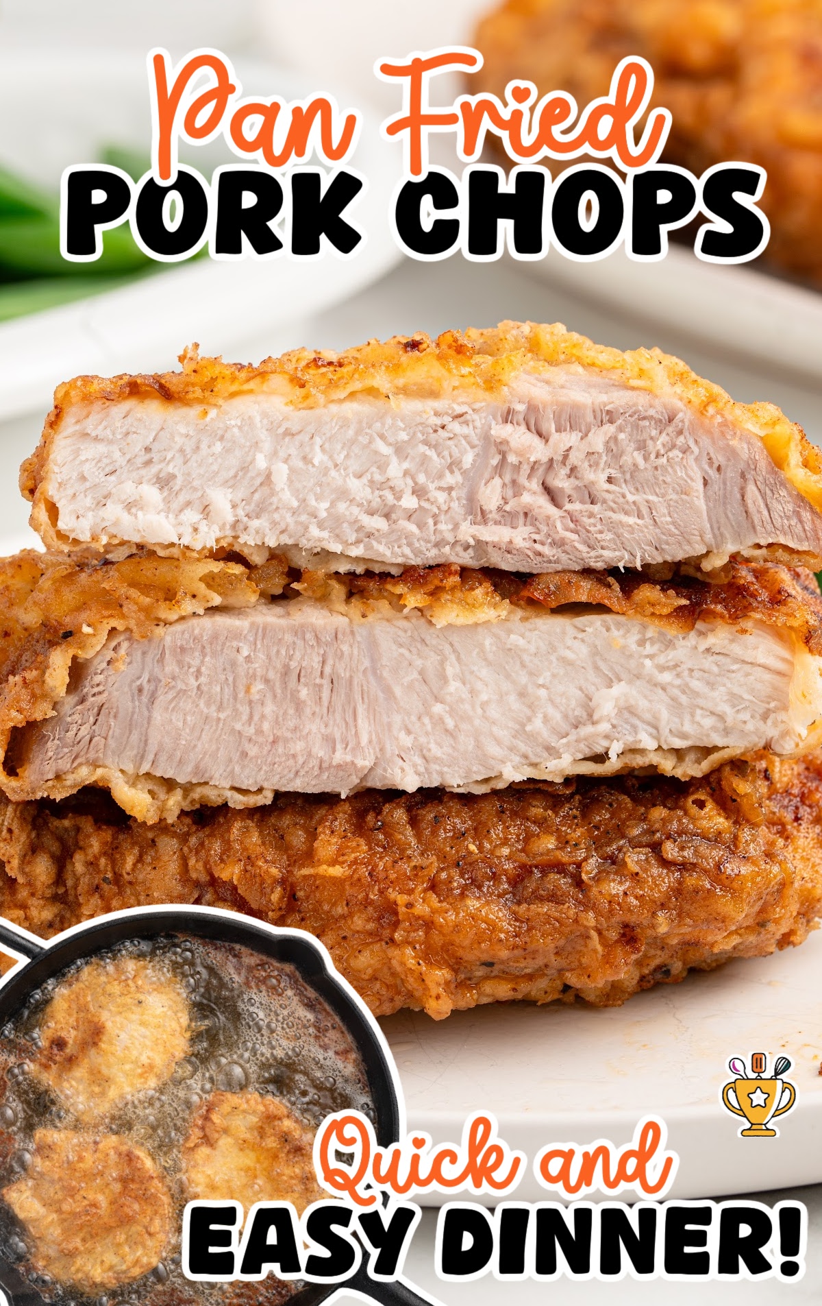 Close-up of a juicy fried pork chop with a crispy golden crust, showing the inside texture, served with green beans on the side.