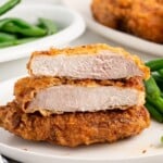 Recipe card showing ingredients and instructions for making pan-fried pork chops, including details on seasoning and cooking.