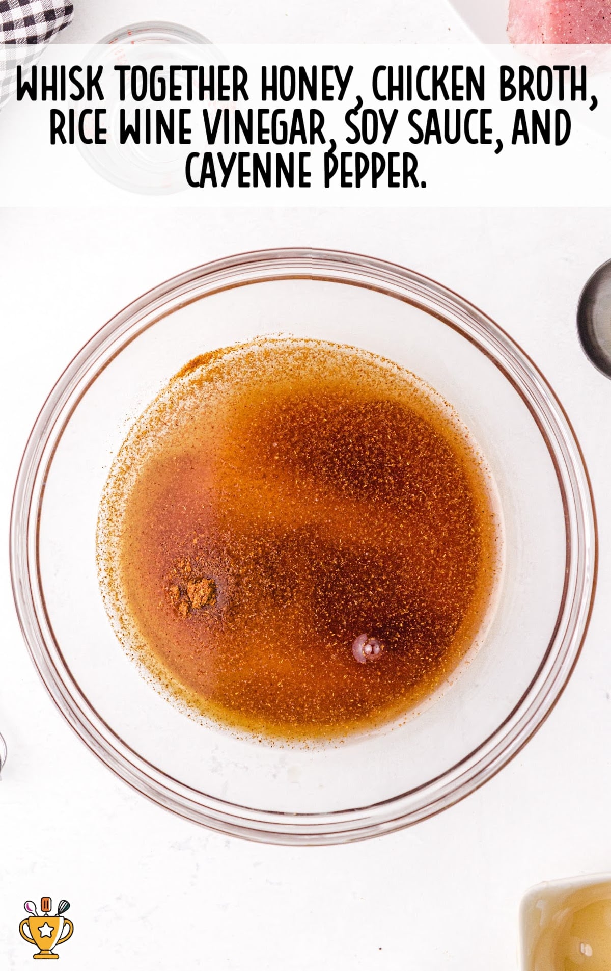 honey, chicken broth, rice wine vinegar, soy sauce and cayenne pepper added to the bowl