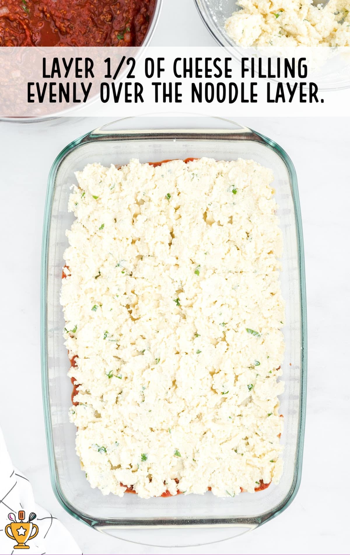 cheese filling over the noodle layer