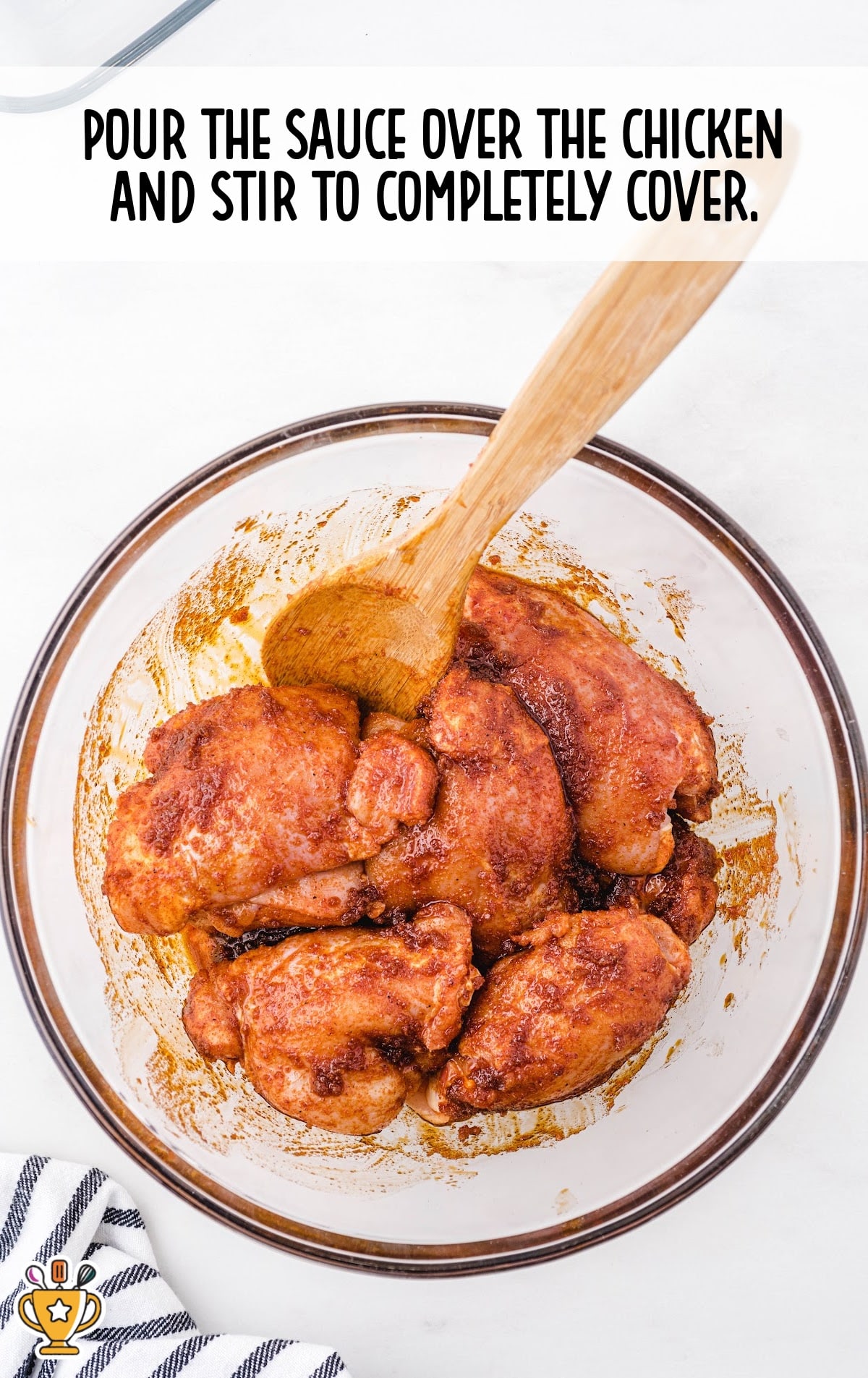 suace poured over the chicken and stirred