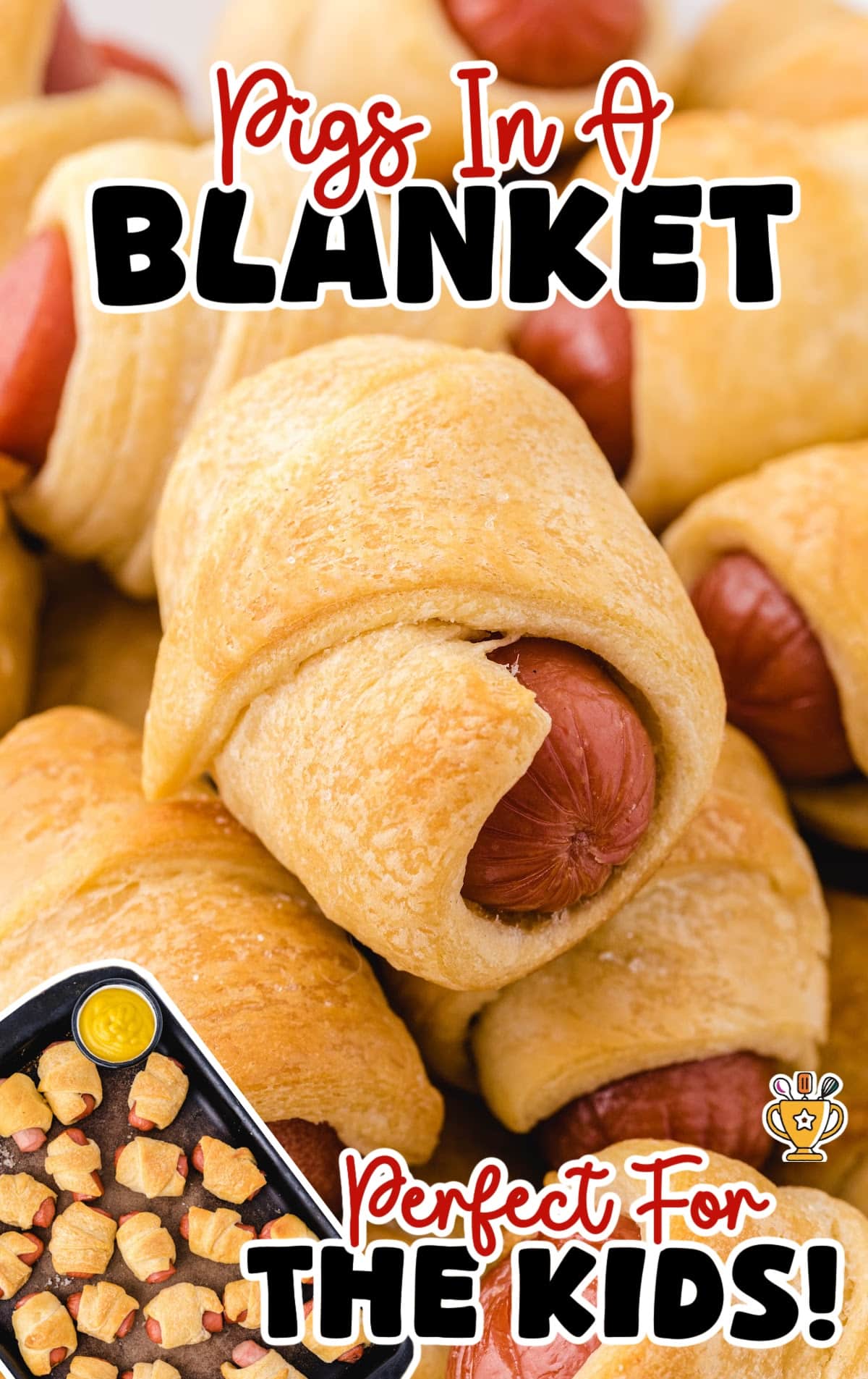 A close-up image of pigs in a blanket served on a plate, showing the crispy, flaky dough around the sausages.
