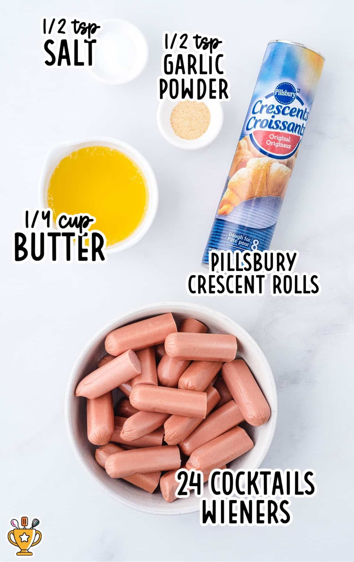 The ingredients for pigs in a blanket: ¼ cup butter, ½ tsp garlic powder, ½ tsp salt, 24 cocktail wieners, and Pillsbury crescent rolls.