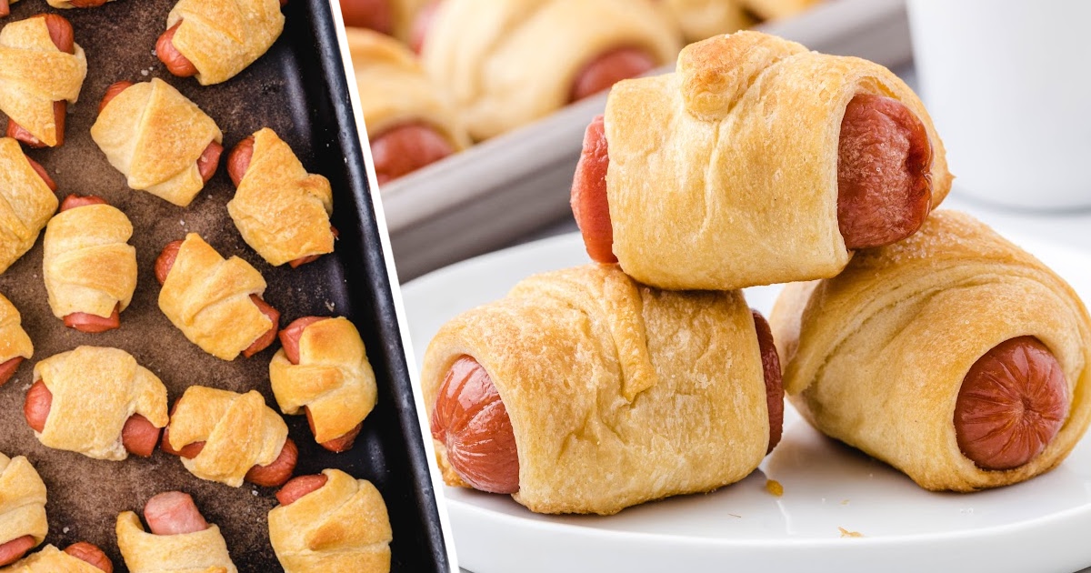 A plate of deliciously golden pigs in a blanket with a few on a baking tray in the background, perfect for a quick snack.