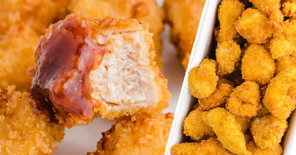 a Popcorn Chicken with a bite on it