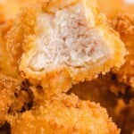 Popcorn Chicken with a bite on it