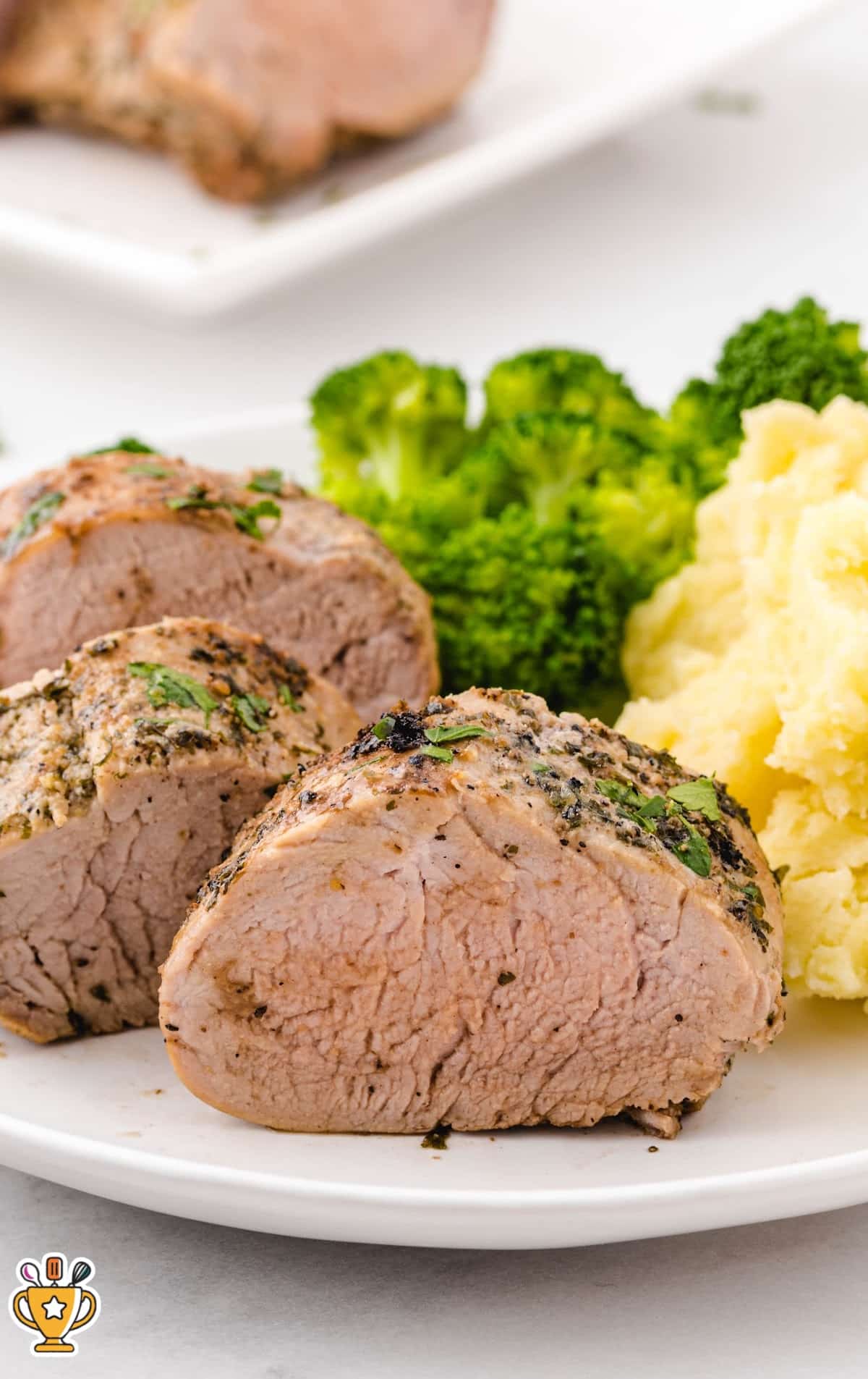 Pork Tenderloin on a plate with broccoli