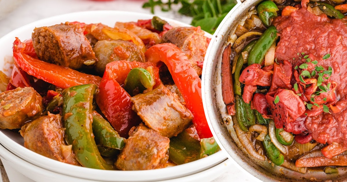 Another view of the sausage and peppers dish in a skillet, with a vibrant mix of peppers and sausage pieces.