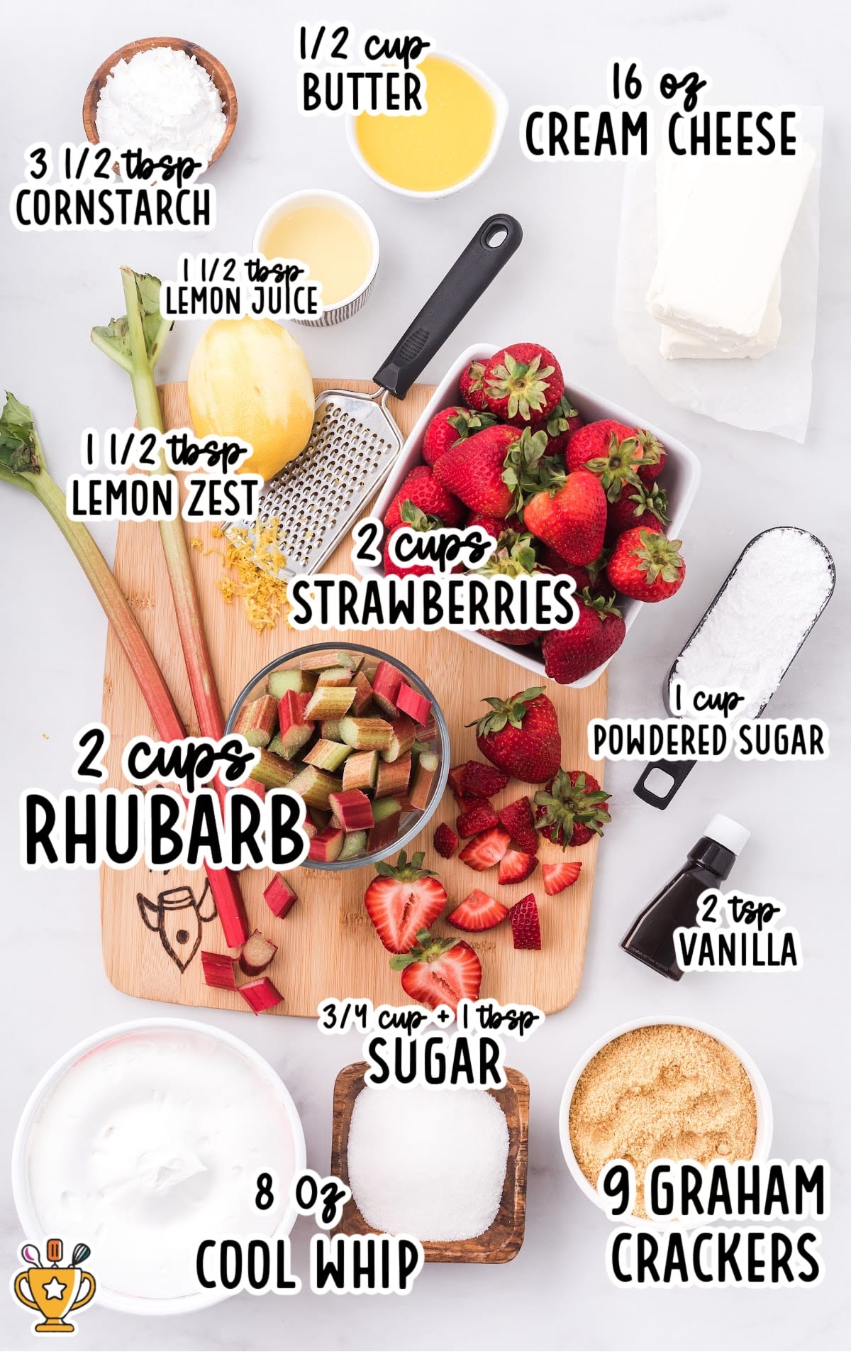 A flat lay photo of all the ingredients needed to make strawberry rhubarb cheesecake: fresh strawberries, rhubarb, cream cheese, butter, cornstarch, powdered sugar, graham crackers, and vanilla.