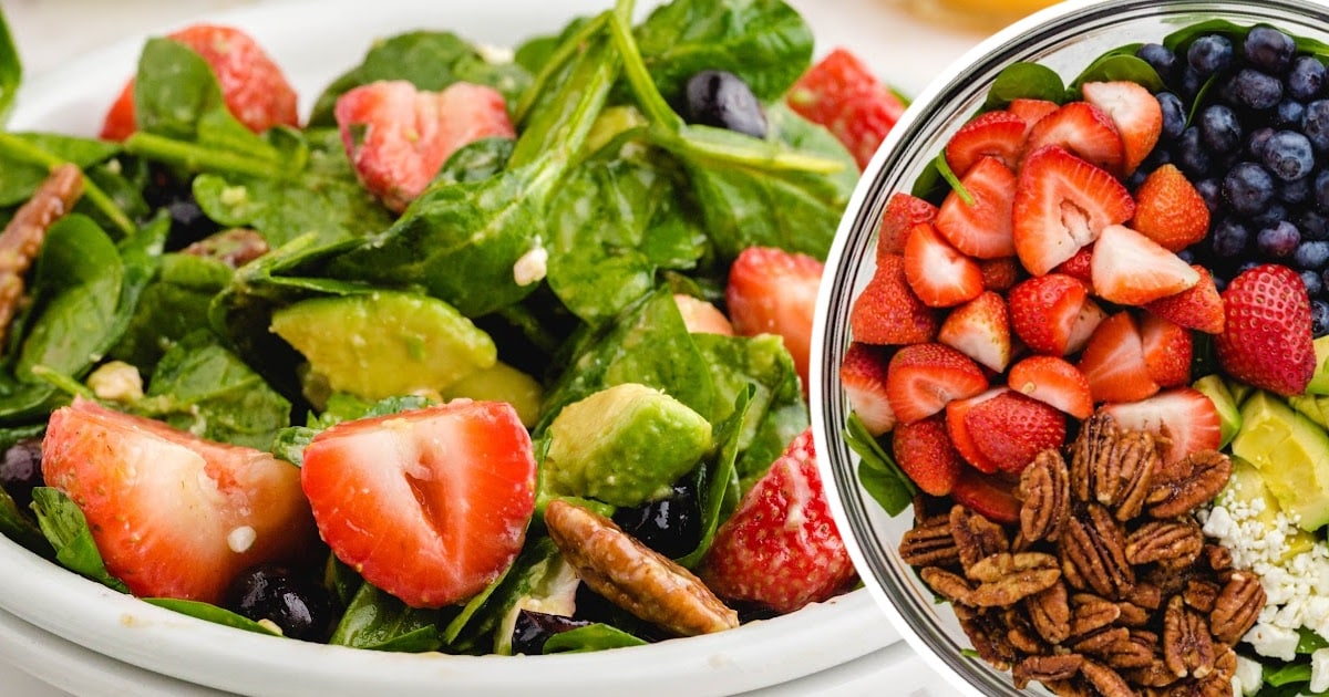 A visually appealing image showcasing a bowl of strawberry spinach salad with vibrant strawberries, spinach, and avocado, perfect for summer.