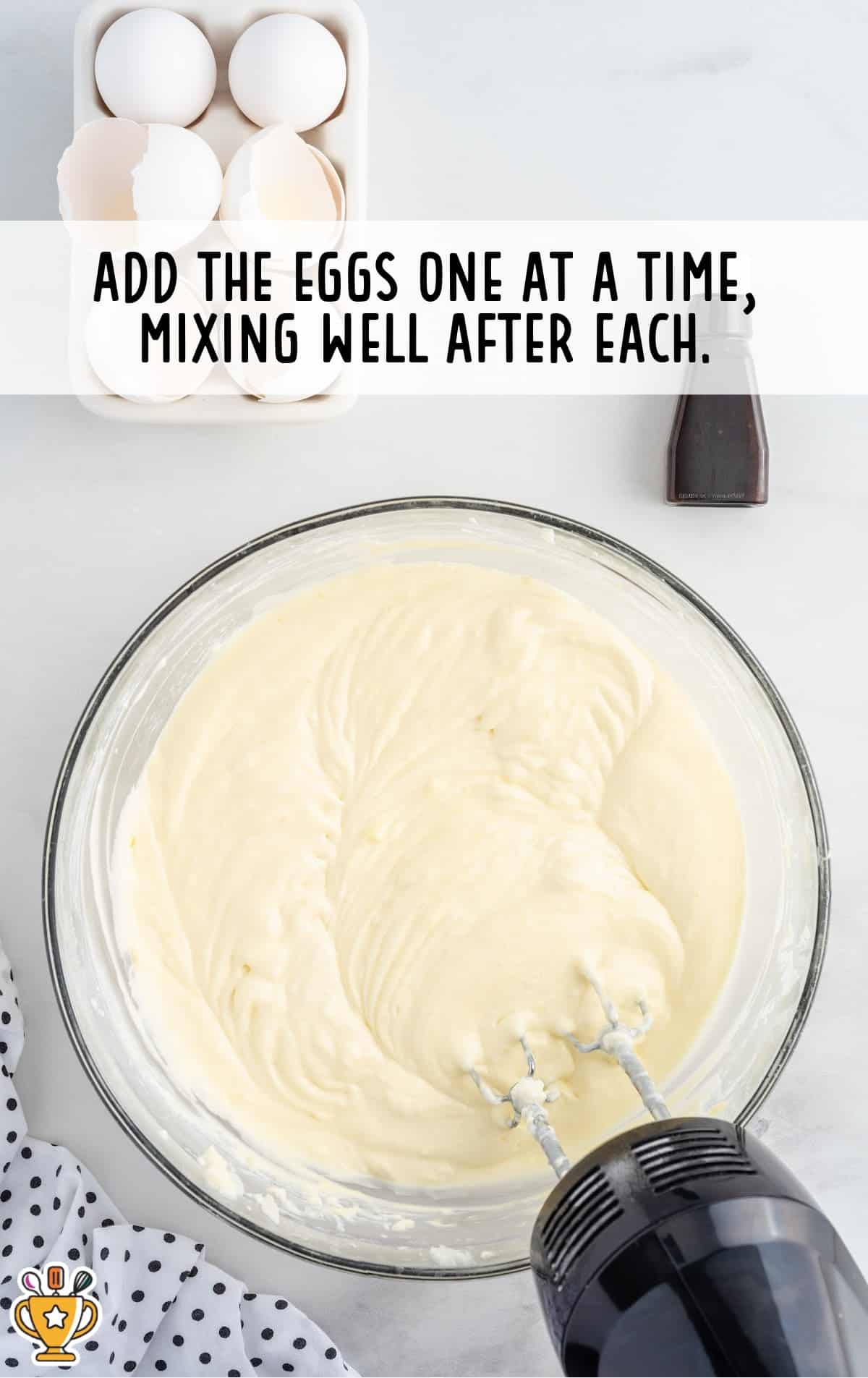adding eggs in a bowl