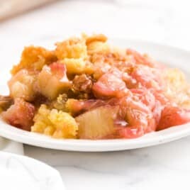 Rhubarb Dump Cake on a white plate