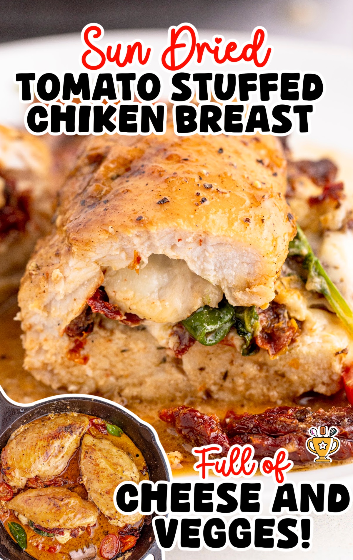 A close-up view of sun-dried tomato stuffed chicken, showing the juicy, cheesy filling along with roasted tomatoes and spinach.
