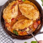 A recipe card showing the steps to make sun-dried tomato stuffed chicken, including ingredient measurements and instructions.