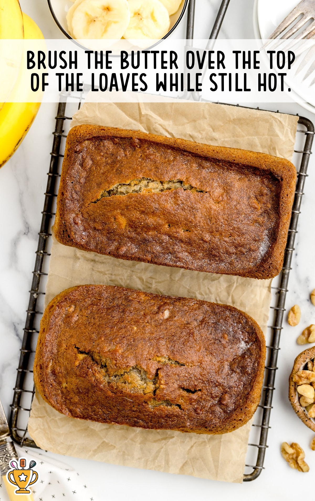 two Air Fryer Banana Bread loaves on a cooling rack
