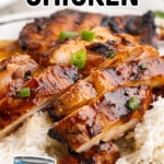 Plate of juicy, sliced Huli Huli chicken glazed with a rich, shiny sauce, served over white rice and garnished with green onions. A can of Dole 100% pineapple juice is shown in the corner, highlighting a key ingredient. Text overlay reads “Huli Huli Chicken – Flavorful and So Juicy!”