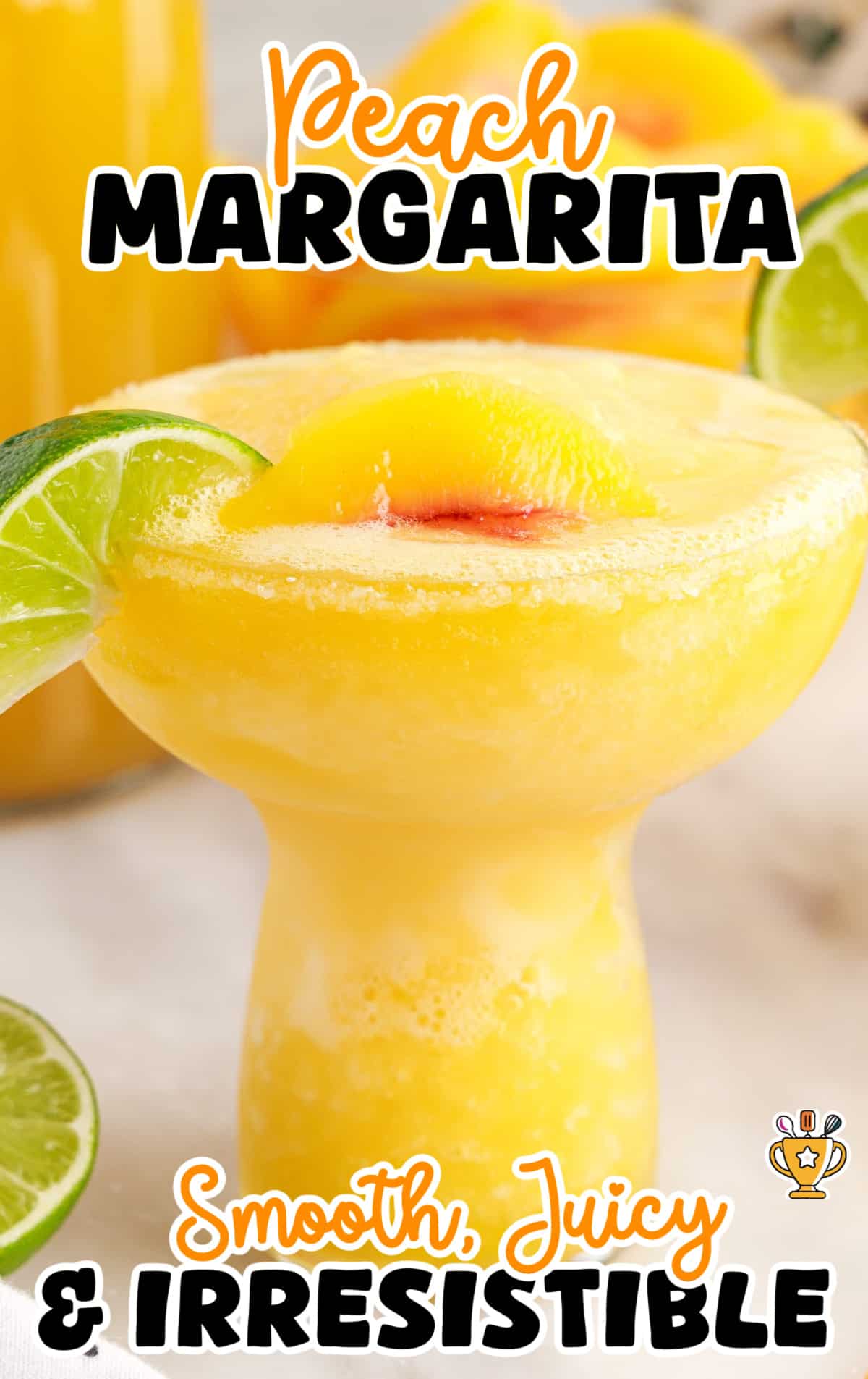 Bright and refreshing peach margarita garnished with a lime slice and served over ice in a cocktail glass