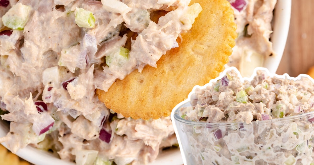 Top view of tuna salad with a cracker dipped into it, paired with a small image of the full bowl on the corner.