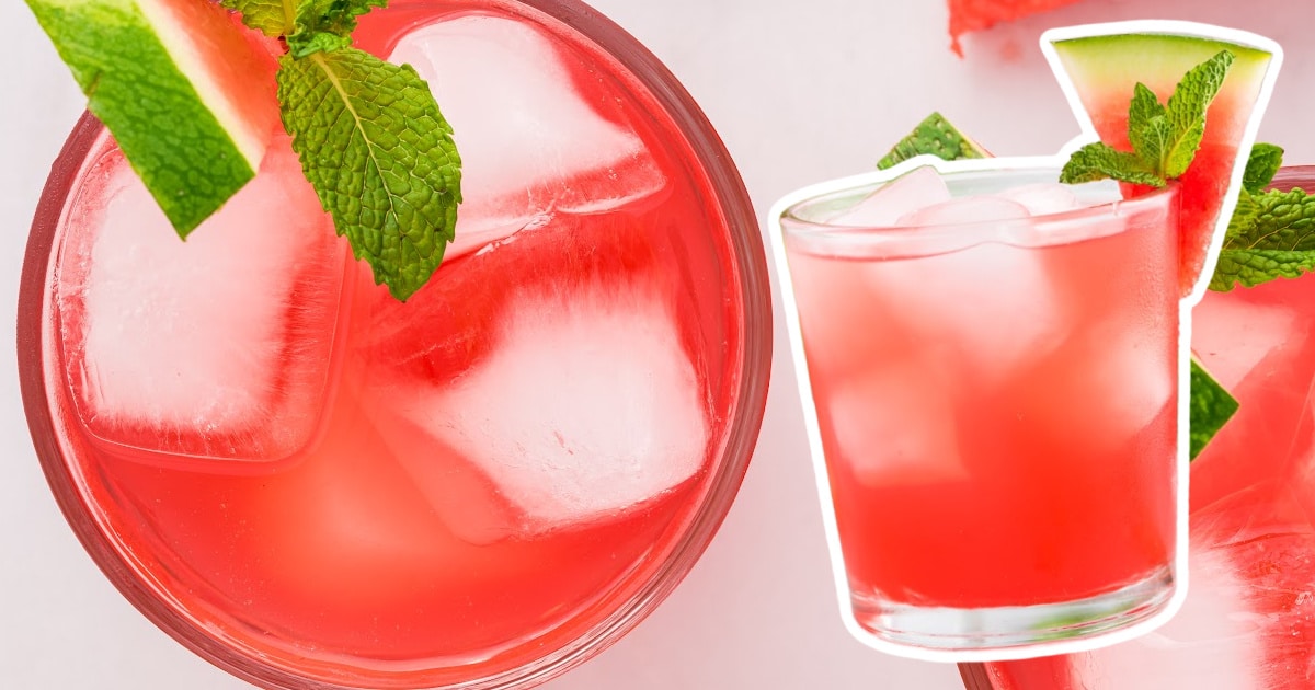 Refreshing watermelon cocktail served in a glass with ice, garnished with mint and a wedge of watermelon, with a Simply Watermelon juice bottle beside it.