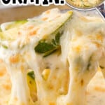 Spoonful of cheesy zucchini gratin being lifted, showing melted cheese pull with zucchini slices; text overlay says “Best Ever Zucchini Gratin – Easy Classic Recipe.”