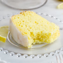 a slice of lemon chiffon cake on a cake
