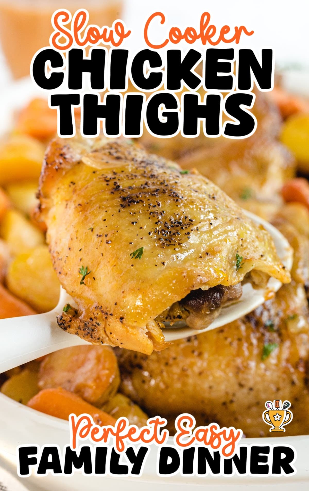 Crispy slow cooker chicken thigh being served with a spoon from a dish filled with carrots and potatoes.