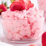 Tall image with bold &ldquo;The Best Jello Salad&rdquo; and &ldquo;Ready in 15 Minutes!&rdquo; headline. Features a bowl of fluffy pink salad and Cool Whip container in the foreground.