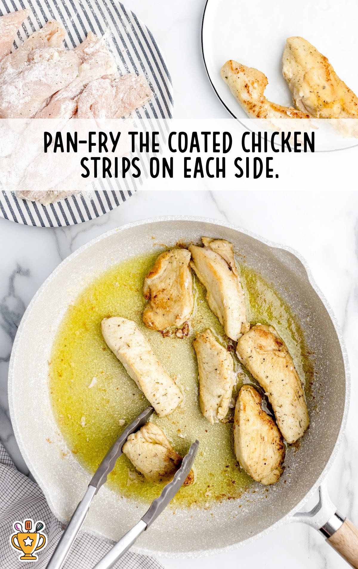 Process shot showing chicken strips pan-frying in olive oil, with raw coated chicken on a plate ready to be cooked.
