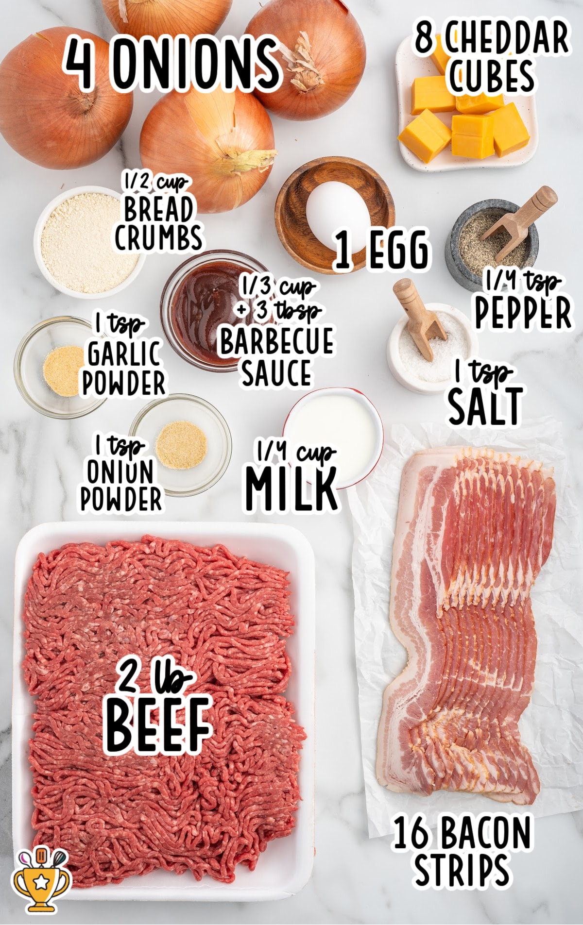 Overhead photo showing ingredients for making onion bombs. Four whole onions, two pounds of raw ground beef, sixteen raw bacon strips, eight cubes of cheddar cheese, one egg, a small bowl of bread crumbs, barbecue sauce in a bowl, a measuring cup of milk, garlic powder, onion powder, salt, and pepper are arranged neatly on a white marble surface.