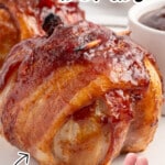 A glazed bacon-wrapped onion bomb sits on a white plate, glistening with barbecue sauce. A hand holds a raw onion filled with seasoned ground beef. Text overlays describe it as savory, smoky, and sweet.