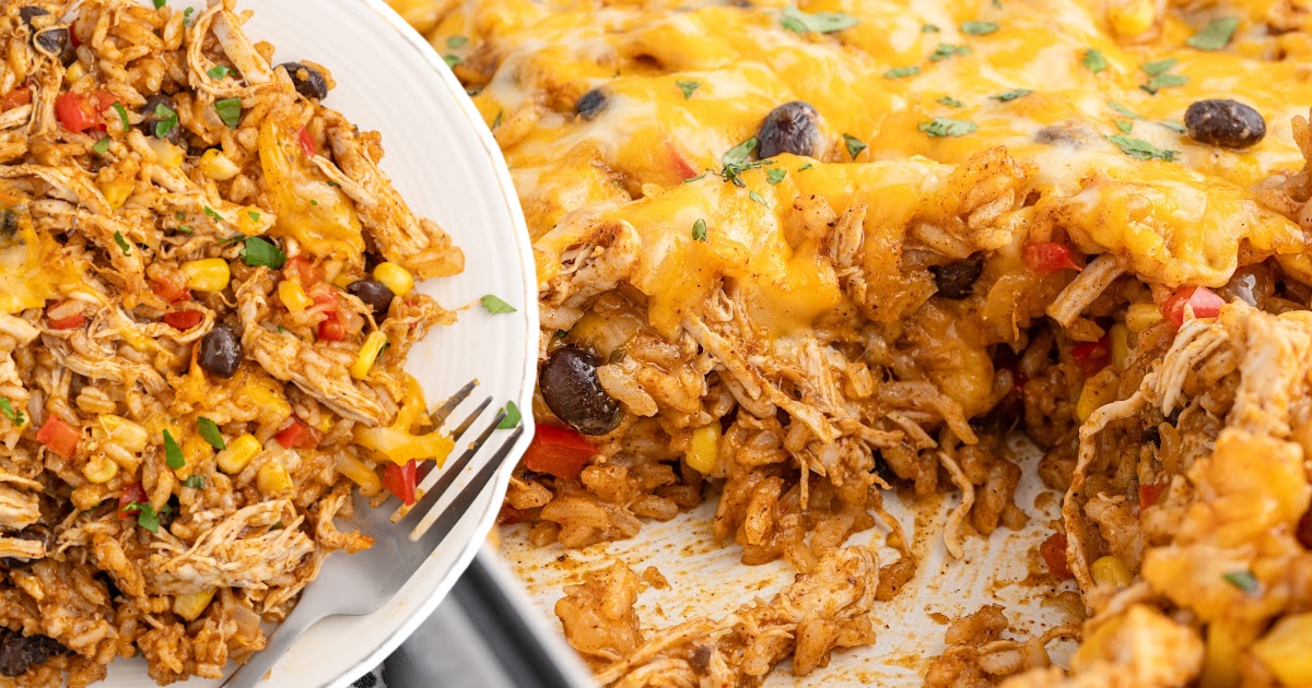 Mexican chicken and rice casserole in baking dish with a portion plated, cheesy casserole recipe with chicken, beans, corn, and rice.