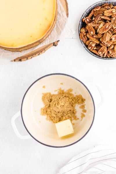 Melt together the butter and brown sugar in a small saucepan over medium heat. Bring to a simmer and cook for 2 to 3 minutes longer. The mixture will deepen in color.