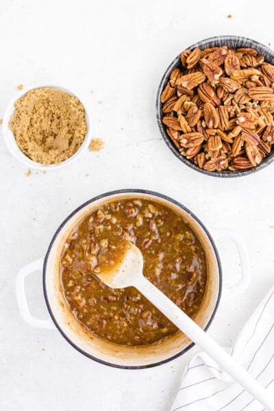 Once the mixture comes to a boil, reduce the heat to medium low and continue simmering until the mixture deepens to a golden brown and thickens. Stir constantly while the mixture is cooking to ensure it doesn&rsquo;t stick or burn to the bottom or sides of the saucepan.