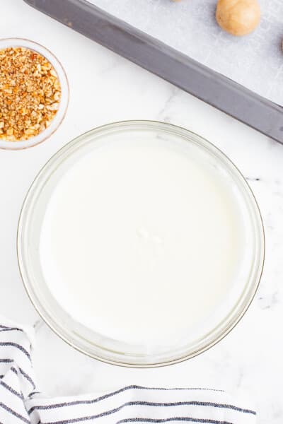Melted White Almond Bark in a White Bowl