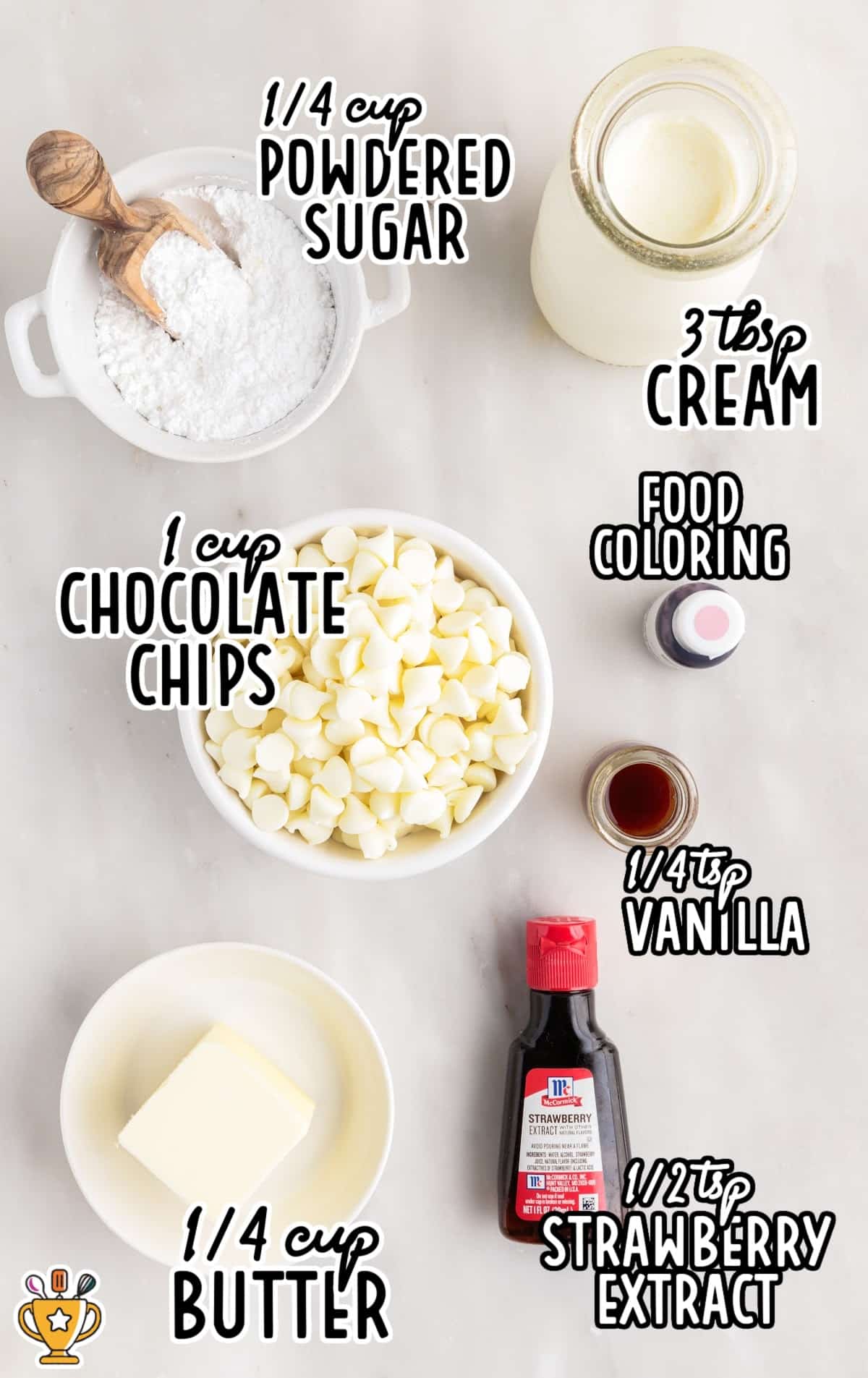 Overhead view of strawberry truffle ingredients including white chocolate chips, powdered sugar, butter, heavy cream, vanilla extract, strawberry extract, and pink food coloring on a light surface.