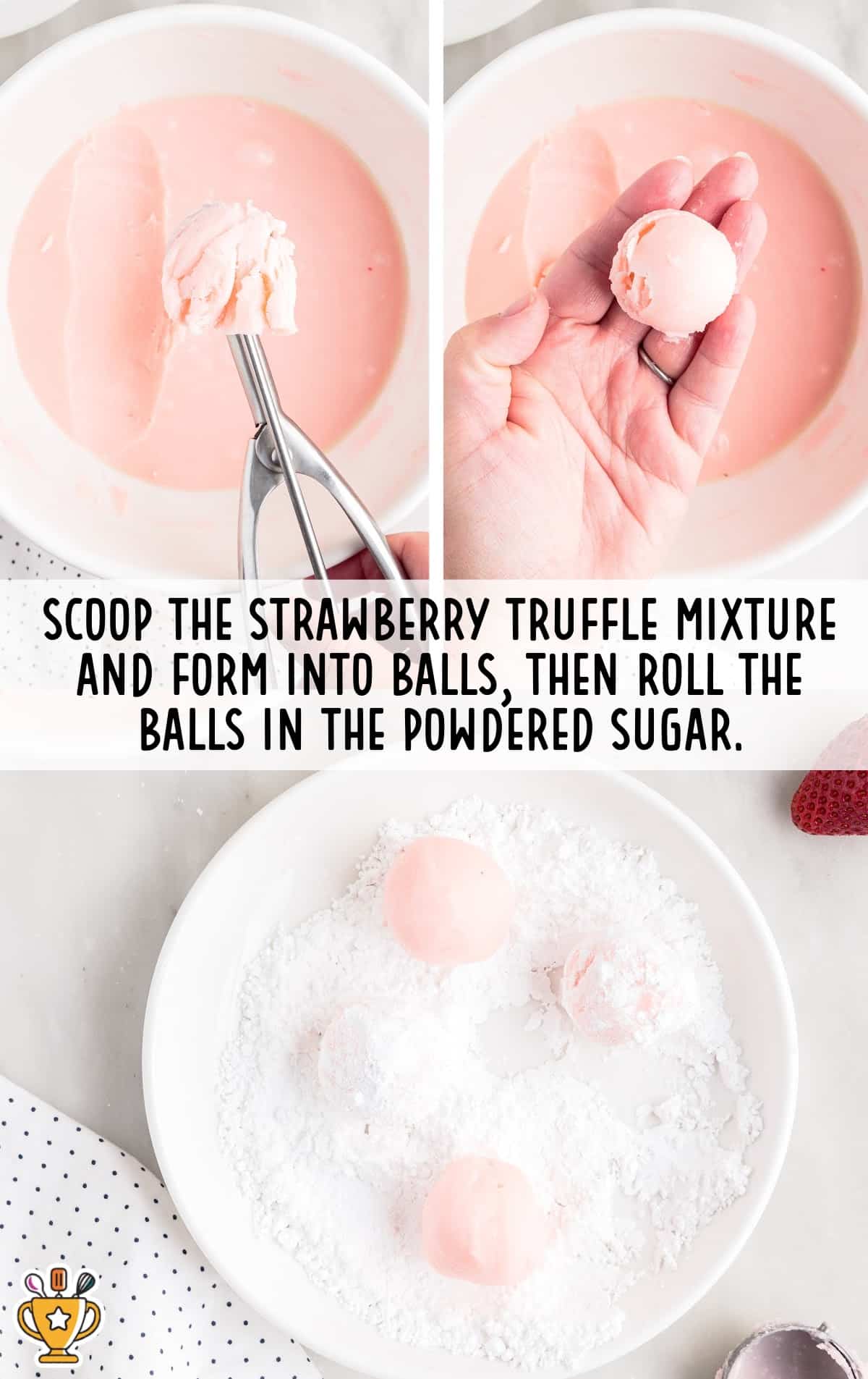 Scoop of strawberry truffle mixture formed into a smooth ball by hand, then rolled in powdered sugar on a white plate to coat evenly.
