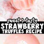 Close-up of strawberry truffles with a soft blush pink center, powdered sugar coating, and fresh strawberries shown in a small glass bowl.