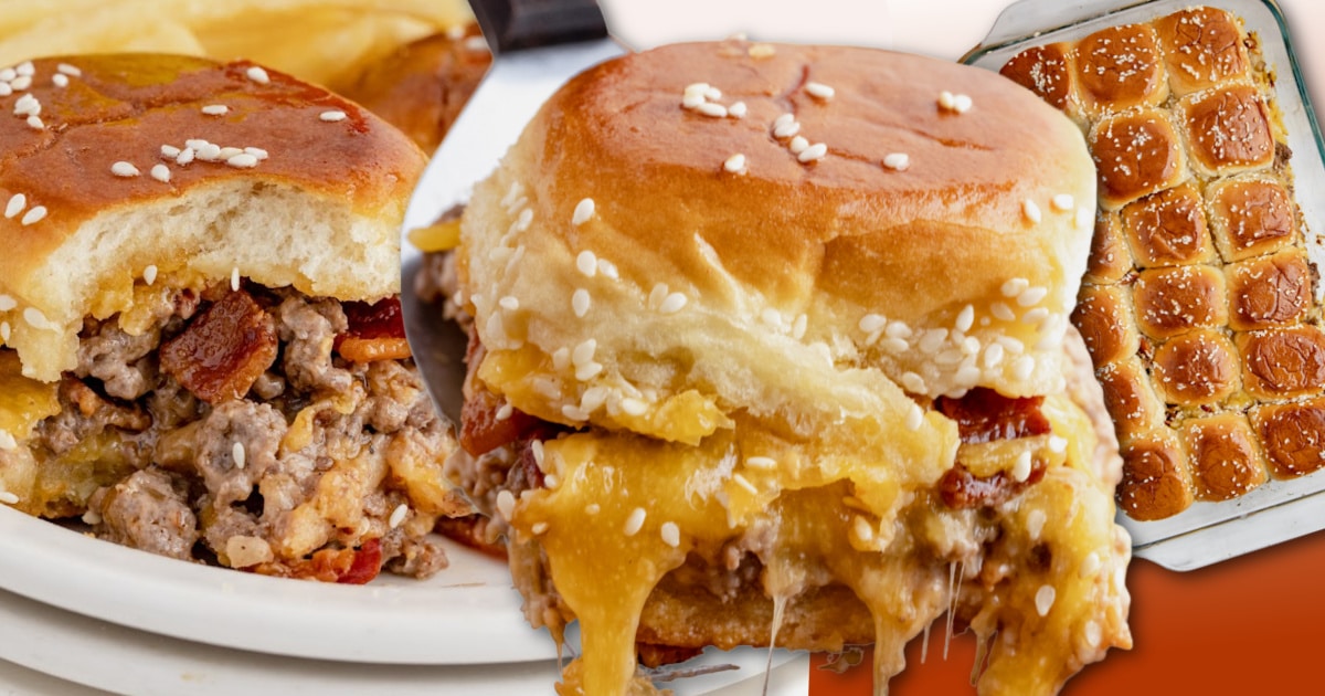 Bacon cheeseburger sliders made with seasoned ground beef, crispy bacon, and melted cheddar on soft sesame slider buns, shown stacked and pulled apart with a baked pan of sliders in the background.