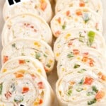 Pinterest graphic featuring rows of ranch roll ups with text reading “Easy Ranch Roll Ups” and “The Best Ever Appetizer,” highlighting soft tortillas filled with ranch cream cheese and colorful vegetables.