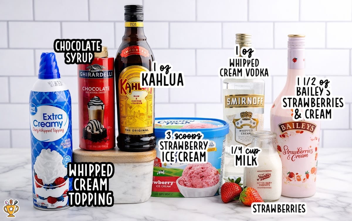 Ingredients for a strawberry mudslide recipe including strawberry ice cream, Baileys strawberries and cream, Kahlua, whipped cream vodka, milk, chocolate syrup, and whipped topping.